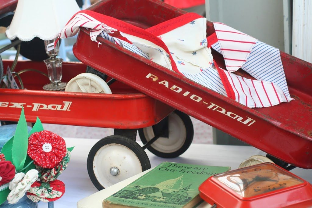 How to shop a flea market with red radio flyer wagons