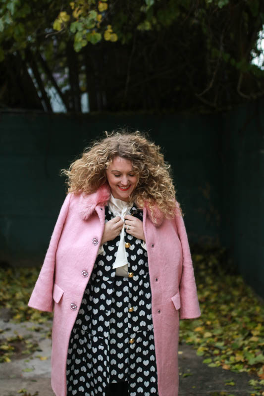 Pink fur Kate Spade coat with diamond buttons. 
