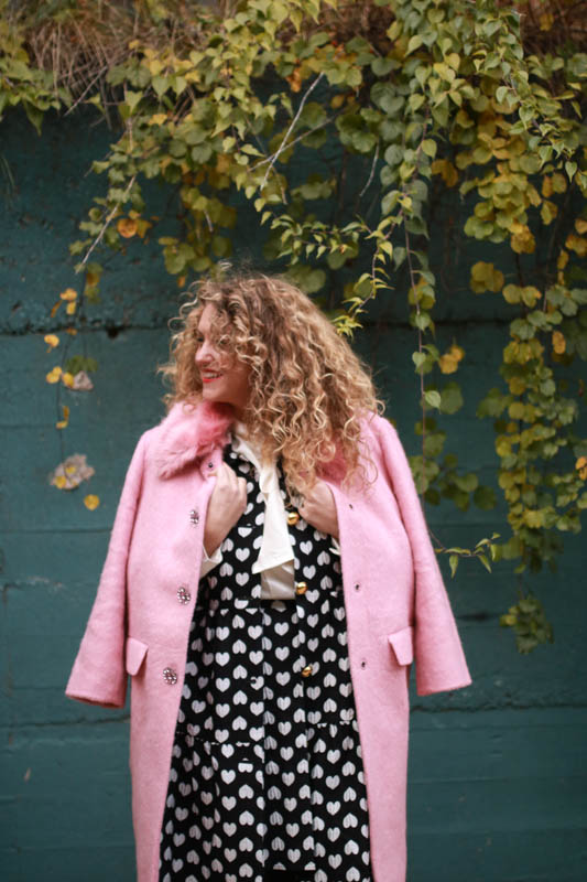 Pink fur Kate Spade coat with a patterned skirt