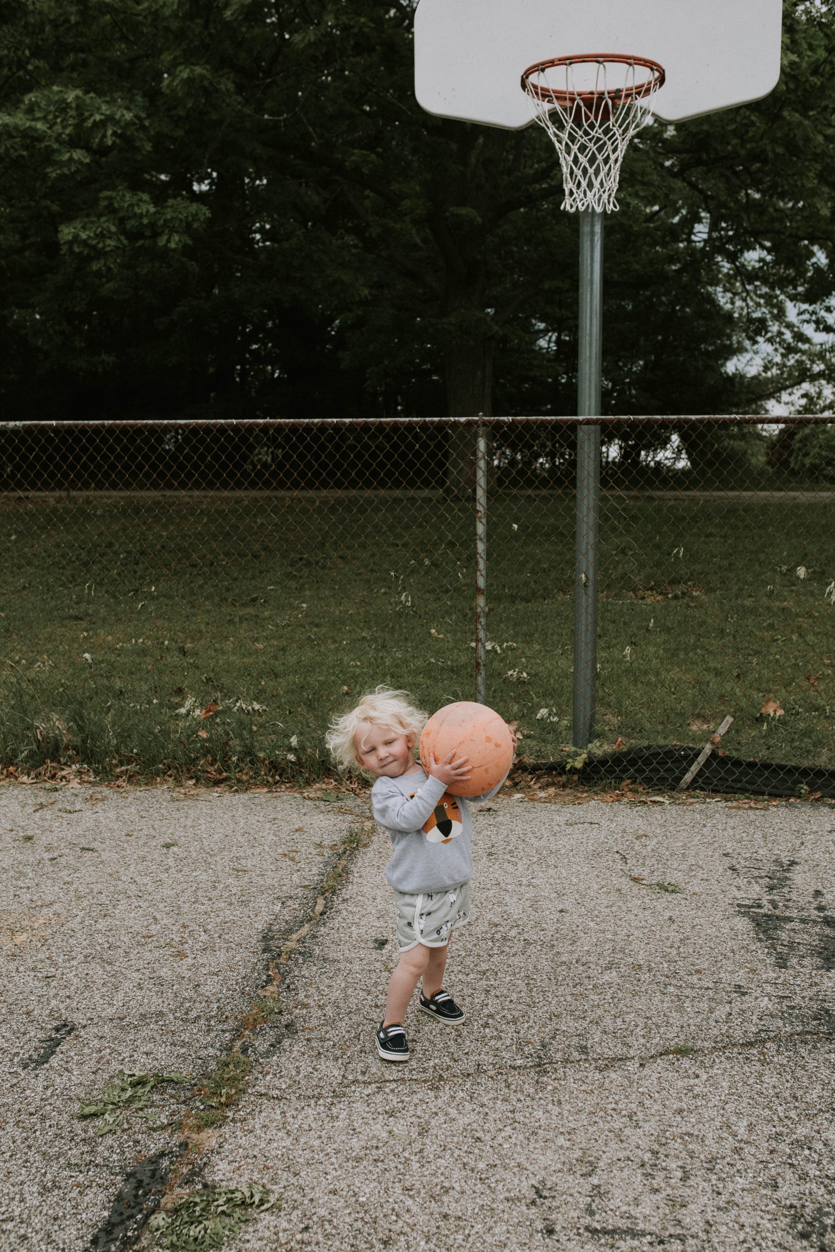 Toddler Playing Basketball