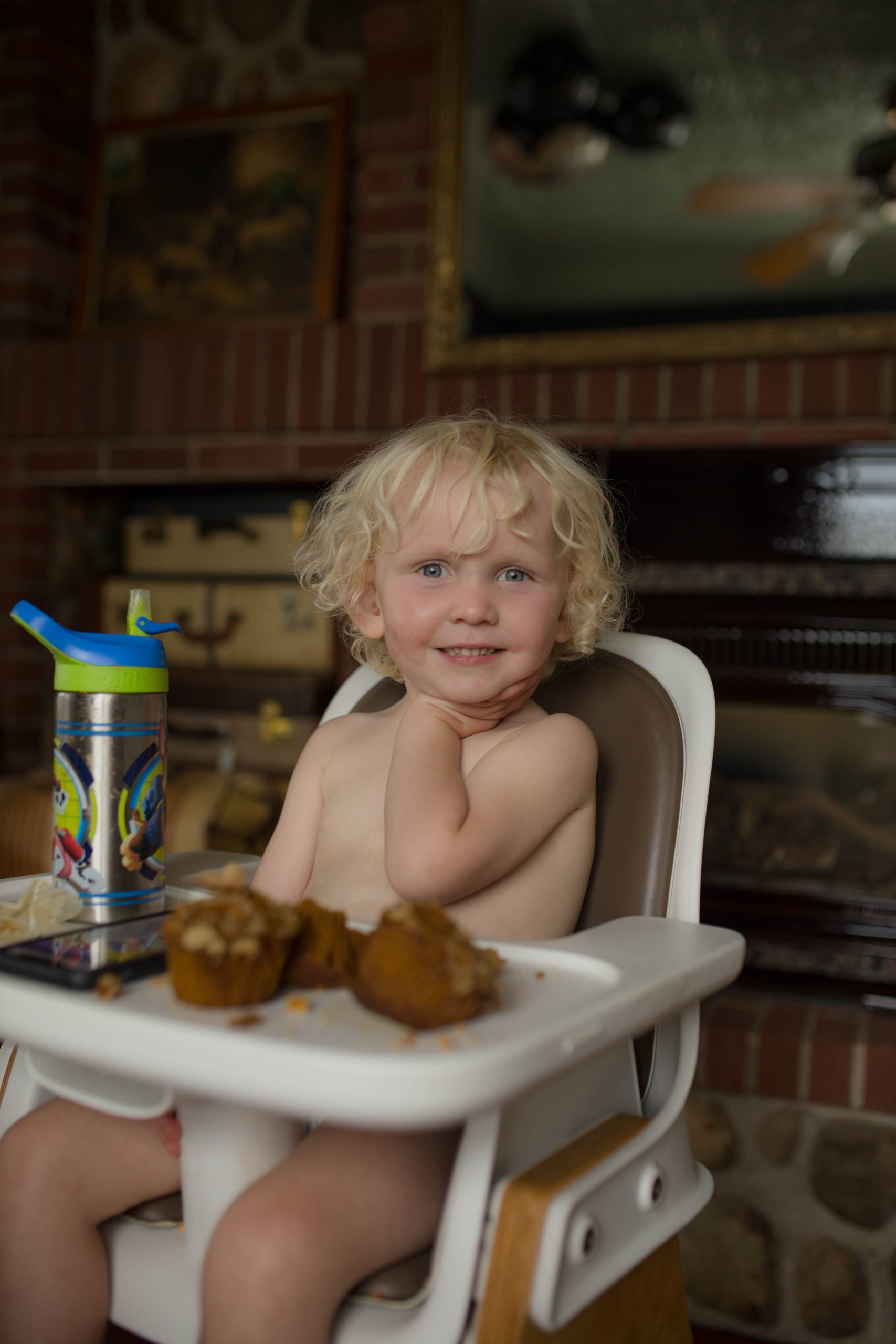 Toddler Eating Pumpkin Muffin